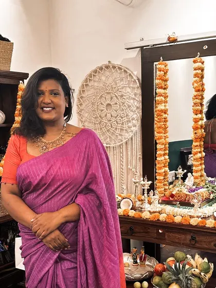 Standing by our Dasara pooja setup at the boutique. Festivals are a time of joy, gratitude, and of course, beautiful sarees.