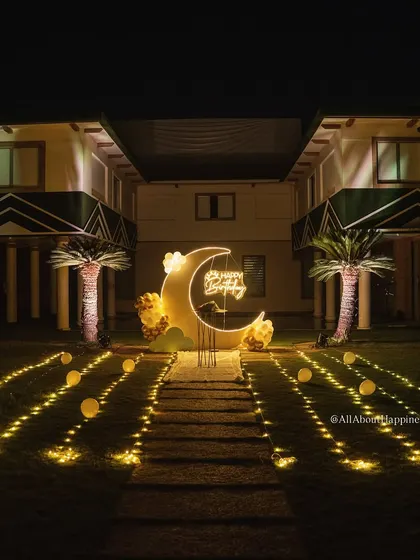 This is how we turn a beautiful outdoor space into a magical, moonlit birthday celebration. The grand moon backdrop, illuminated pathway, and neon sign create an unforgettable, Pinterest-worthy moment for any moon lover.