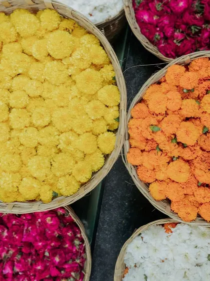 Baskets of vibrant marigolds, a staple in traditional Indian wedding decor.