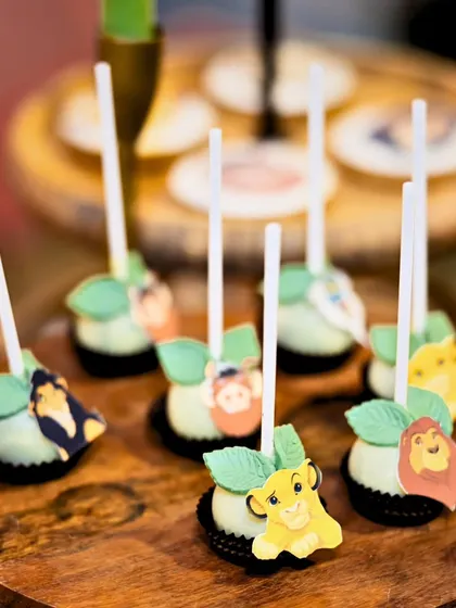 Delicious cake pops decorated with edible Lion King characters were a tasty and on-theme treat for the guests.
