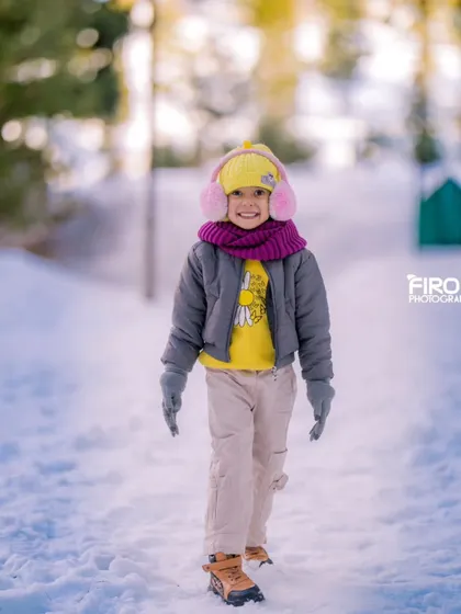 The pure joy of a child playing in the snow. Capturing my daughter's happy smile during our Kashmir days is a reminder of why I love preserving these fleeting, precious moments.