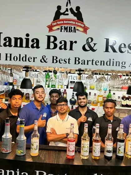 Students at our bar learning about different syrups and flavors, an essential part of our beverage knowledge training.