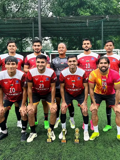 The team celebrating their victory at the Clash of Champions tournament.