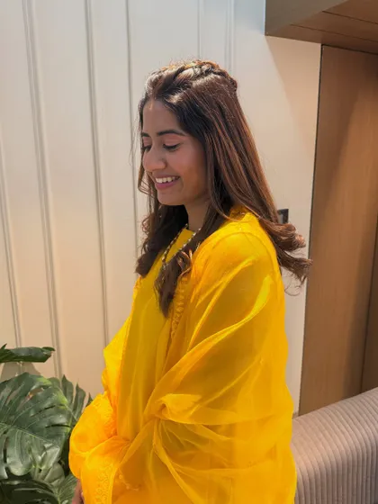 A candid smile from my happy client. Her simple and elegant hairstyle is perfect for the festive occasion.