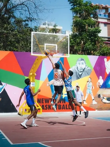 Driving to the basket for a contested layup against a tough defender. My personal training focuses on developing moves to beat your opponent one-on-one.