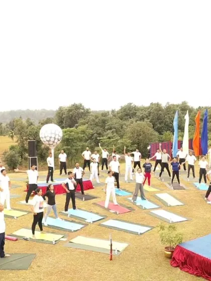 Another angle from our large-scale yoga event, showing the vibrant and energetic atmosphere. We believe in making yoga accessible and enjoyable for everyone in the community.
