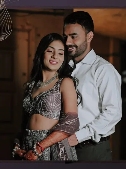 Dr. Ekta Jain nailing her sangeet look in a grey lehenga with a plunging neckline. She looks like a goddess with a smile that could move mountains.