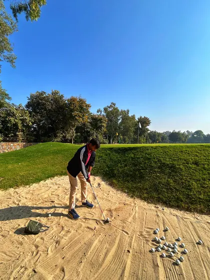 A golfer works on his bunker game, a key skill for any serious player. Our dedicated practice areas allow you to isolate and improve specific parts of your game.