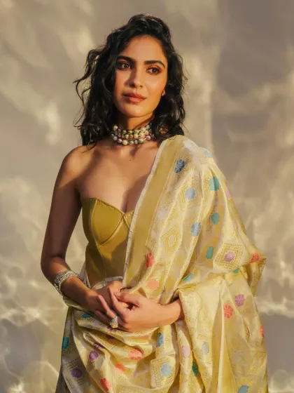 Another look from the Benarasi campaign, this time featuring a beautiful woven dupatta draped over a modern bustier top. It's a perfect example of mixing traditional textiles with contemporary silhouettes.