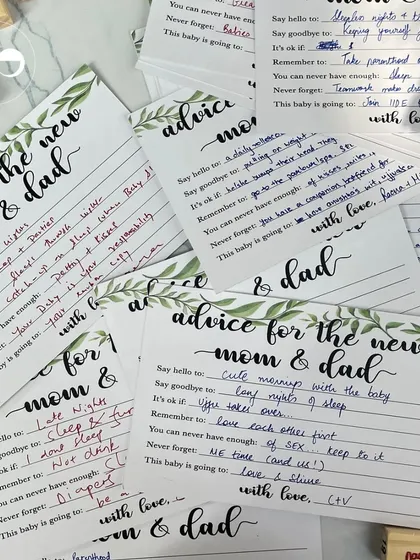 'Advice for the new mom & dad' cards are a wonderful keepsake. This interactive element allows guests to share their wisdom and well wishes in a personal way.