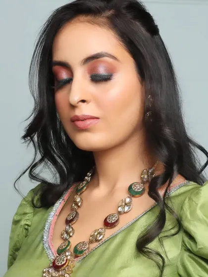A close-up of a soft engagement look I created. The focus here is on the beautiful dual-toned eyeshadow, blending pink and shimmery tones, paired with a clean winged liner for an elegant finish.