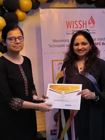 Receiving a certificate after leading a hands-on workshop on GFC Therapy at the Wockhardt Institute. Empowering fellow practitioners with advanced facial injecting techniques elevates our entire field.