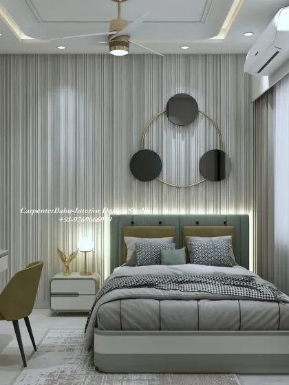 The bed is set against a wall with striped wallpaper and a modern, circular art piece. The design is simple, yet the combination of patterns and textures makes it visually interesting.