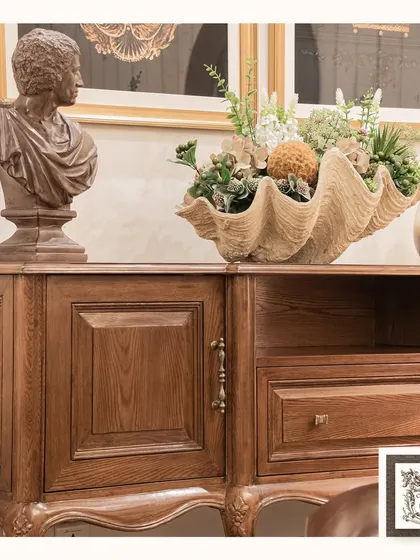 A close-up view reveals the rich grain of the wood and the quality craftsmanship of this cabinet. It's a piece designed to be a timeless addition to your home, offering both storage and style.