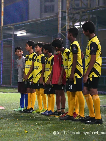 A coach lines up his players, giving instructions before a drill. Organization and discipline are key components of my training sessions.