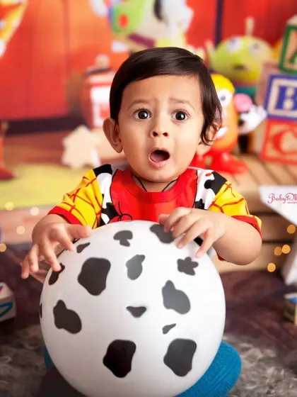 Look at that surprised expression. This little Woody from Toy Story is giving us all the feels. Character themes are a super fun way to celebrate a first birthday.