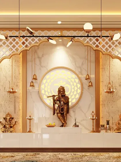 We design sacred spaces that are both divine and architecturally integrated. This expansive pooja room features an ornate marble and lattice-work backdrop, dedicated niches for idols, and intricate lighting to create a serene and powerful spiritual center in the home.