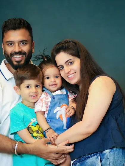 A happy family of four, all bundled together. I love capturing the energy and love in a growing family.