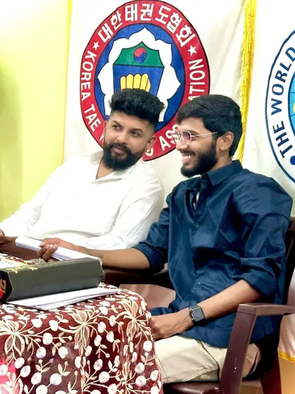 Sharing a lighter moment during the belt examinations.