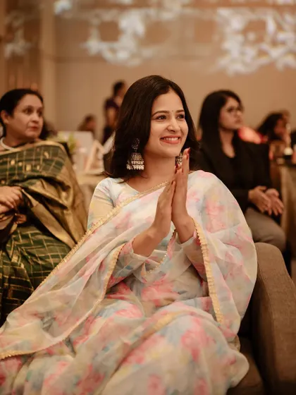A candid shot of a guest enjoying an event. Capturing the happiness of friends and family is also a key part of my wedding coverage.