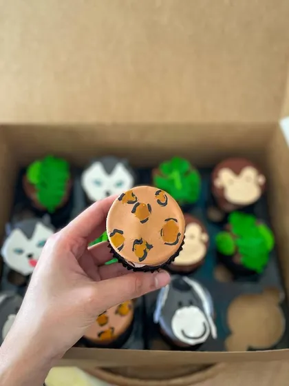 This cupcake has a fun leopard print pattern made with fondant.