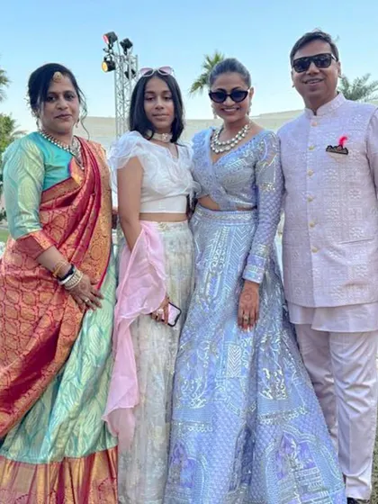 A dapper dad and his beautiful daughter in coordinated shades of regal pastels. His custom bandi and kurta set complements her stunning lehenga perfectly.
