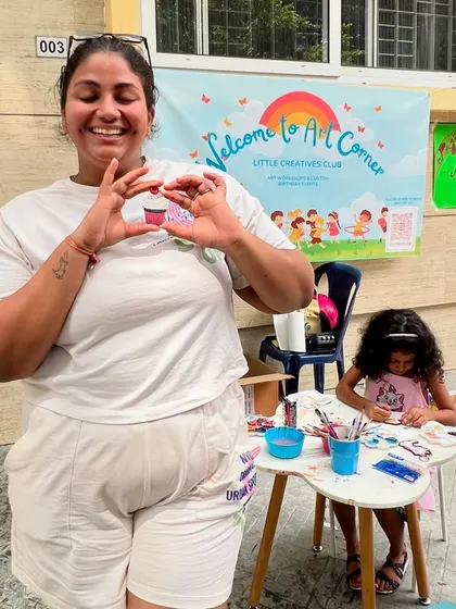 That's me, completely overjoyed by the turnout and the beautiful art being created. It's a joy to share our passion with the community.