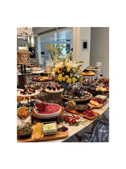 My grazing tables are designed to be a feast for the eyes and the palate. This lavish spread features an abundance of artisanal cheeses, charcuterie, fresh fruits, dips, and breads, creating a welcoming centerpiece for any celebration.
