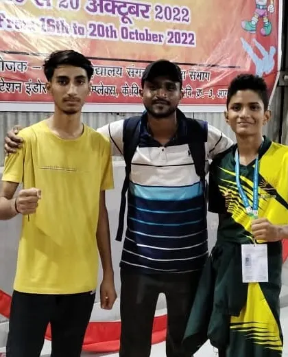 With my student Rudra and his teammate after his gold medal win. The bond between students is one of our greatest strengths.