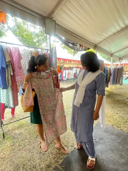 Even an image consultant needs a little help from her friends! Here I am getting some valuable shopping advice from my lawyer friend at a local exhibition.