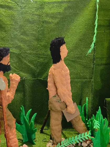 A close-up of the figures from our "evolution of man" project. Creating these models themselves helps children internalize the information and gives them a sense of ownership over their learning.