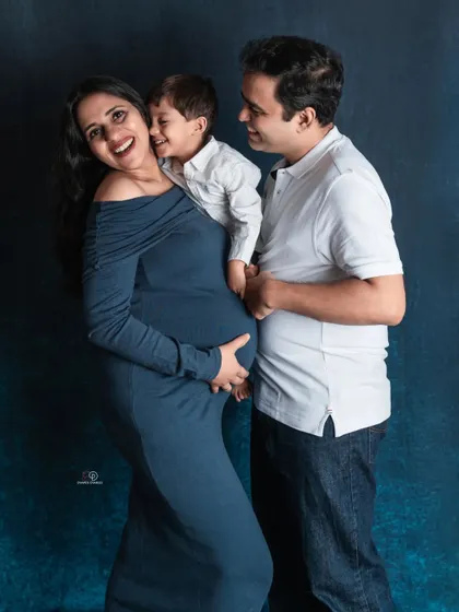 The sweetest moment between mom, dad, and the big-brother-to-be! Capturing these candid interactions is my favorite part of a family maternity photoshoot.