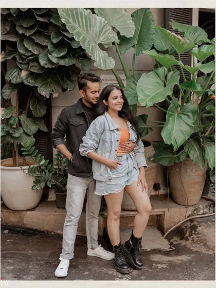 A candid portrait of a couple enjoying each other's company during their relaxed Mumbai pre-wedding shoot.