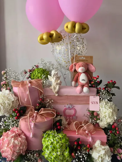 A full shot of the pink floral hamper.