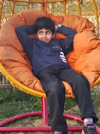 "Hit the greens, live the dreams." This young guest knows how to relax and enjoy the cozy atmosphere at Zen Golf.