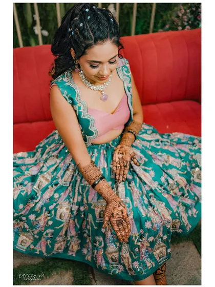 Showing off the beautiful mehendi design.