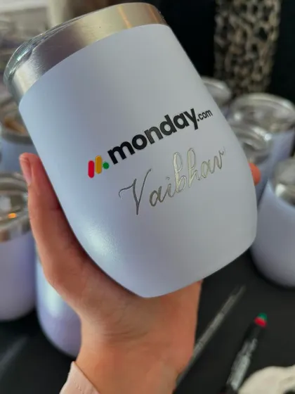 Another look at a custom-engraved tumbler for the Monday.com event. Each name is carefully etched by hand, ensuring every guest receives a unique and personal gift.