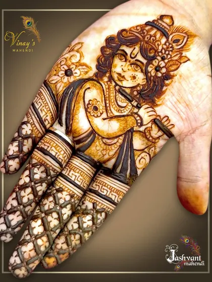 A classic depiction of Lord Krishna playing his flute. This Janmashtami special design fills the palm with divine music and intricate details.