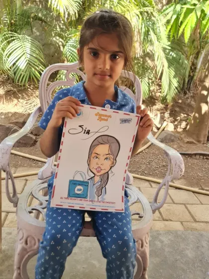 A sweet portrait of a young girl named Sia. I enjoy making the experience fun for kids, ensuring they leave with a piece of art they love.