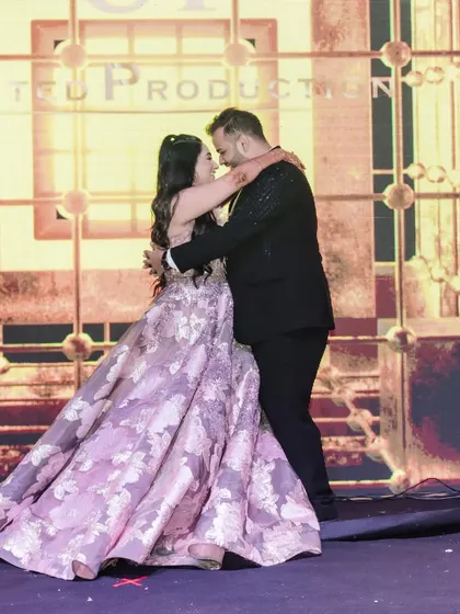 A classic, romantic embrace during a couple's first dance. I focus on creating choreography that feels comfortable and connected, allowing you to get lost in the moment together on your big day.