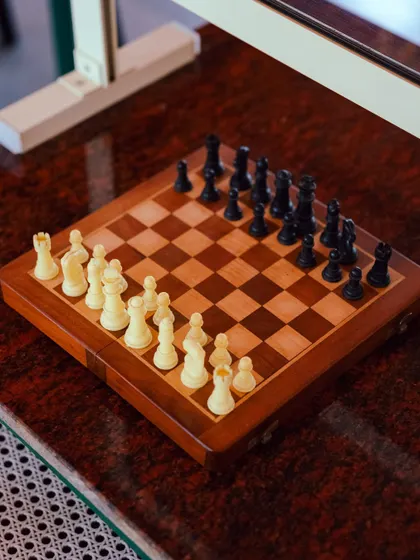 Another classic chessboard awaits players. It's the perfect way to engage your mind and pass the time in one of our comfortable lounge areas.