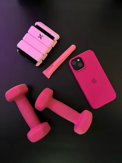 I identify as a Pilates Princess, and these are my essentials. All pink everything, from my weights to my phone case.