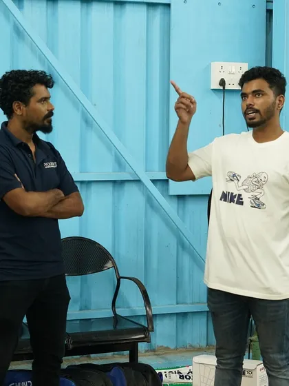 Aditya Prakash shares a technical point with a group of coaches. His ability to translate complex strategies into actionable advice is a key asset for everyone in my certification program.