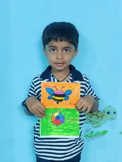 Another proud pose from the artist with his colorful animal drawing.