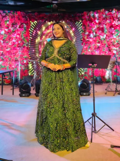 Dressed in a traditional green bandhani anarkali for a Krishna-themed naming ceremony. My attire was chosen to align with the spiritual and celebratory nature of this beautiful event.