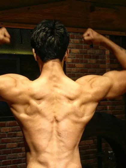 My kind of Christmas tree. This back shot shows the results of years of consistent pull-ups and rows. Strength training is what sculpts the body.