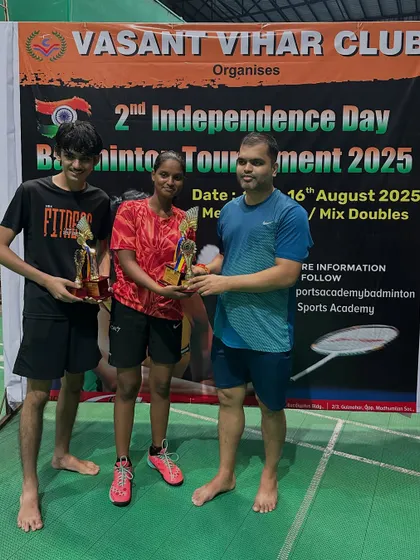 Rishi and Muskan, the C Group Mixed Doubles winners, with their well-deserved trophies.