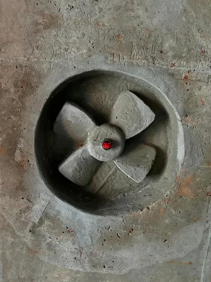 A close-up of the fan detail in Archana Hande's studio. This playful element, complete with a red bindi at its center, is an example of how we embed art and personality directly into the architectural fabric of a home.