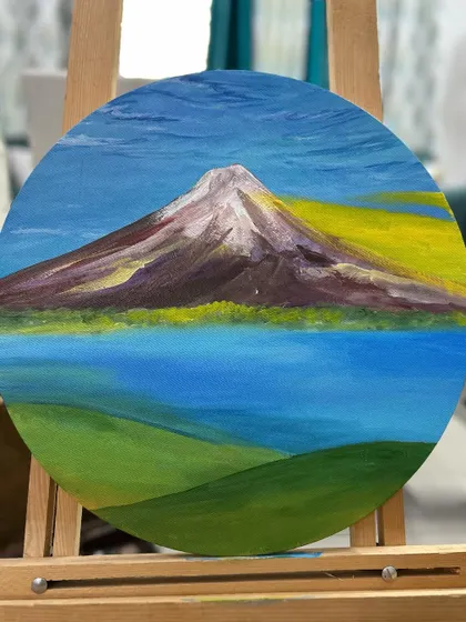 An earlier, in-progress shot of the Mt. Fuji painting. You can see the initial layers of color and the basic composition before the details were added.
