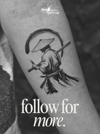 A lone samurai warrior, captured in a moment of contemplation. This black and grey tattoo uses minimalist brush stroke effects and detailed shading to convey a sense of honor and discipline.